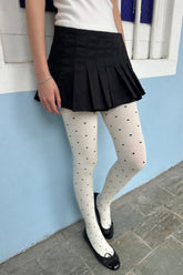 White with Black Polka Dots